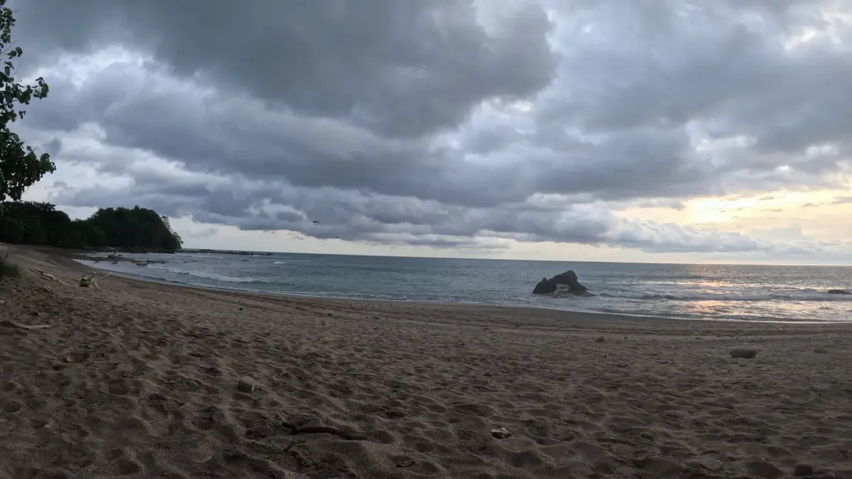 Quiet beach cove along the Santa Teresa coast at sunset