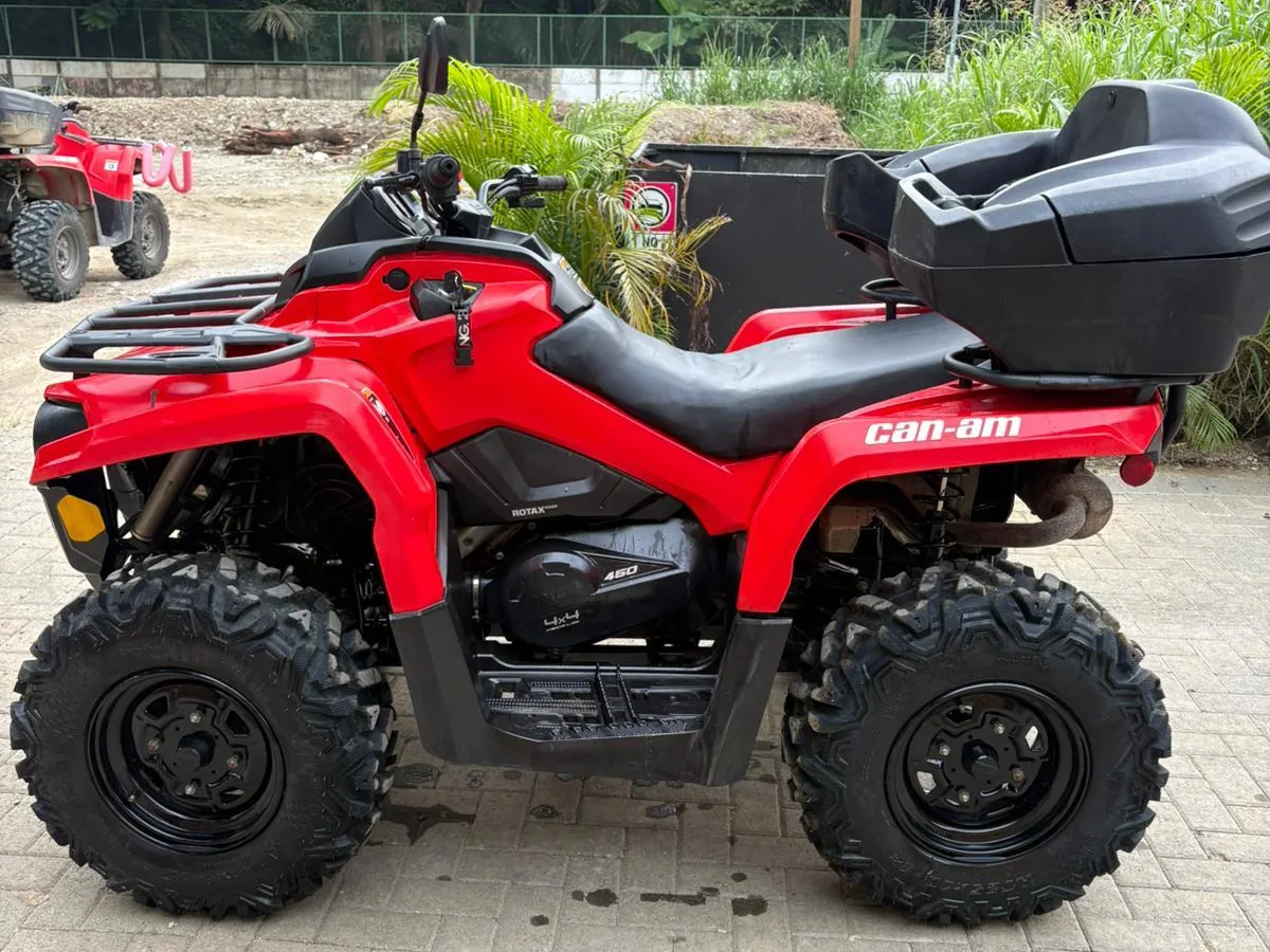 Red Can-Am 450 4x4 ATV, part of our mixed fleet in Santa Teresa